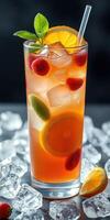Refreshing fruit drink garnished with strawberries and mint on a bed of ice in a vibrant setting photo