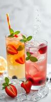 Refreshing summer drinks with fruits and mint on a marble surface photo