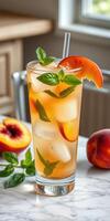 Refreshing peach iced tea with fresh mint and fruit, perfect for warm summer afternoons photo