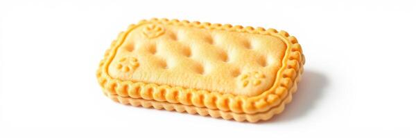 Cookie resting on a white surface, showcasing its textured design and golden color under soft lighting photo