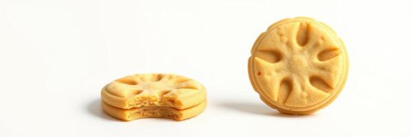 Unique round and bite-sized cookie with an intricate design displayed on a clean surface photo