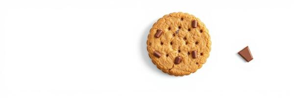 Delicious freshly baked chocolate chip cookie on a clean white background ready to be enjoyed photo
