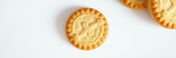 Delicious round cookies on a clean white surface ready to be enjoyed after baking in a warm kitchen photo