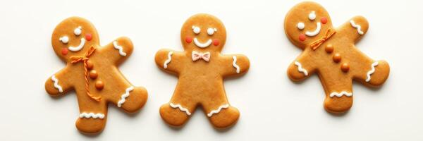 Gingerbread cookies decorated with icing and edible details ready for holiday celebrations and festivities photo