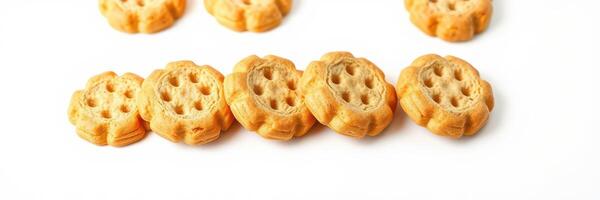 Cookies arranged in a decorative pattern on a white surface showcasing their unique shapes and textures photo