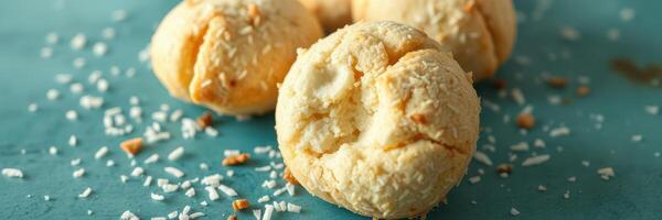 Delicious coconut cookies crafted with fresh ingredients on a vibrant blue backdrop photo
