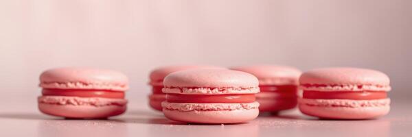 Delicious pink macarons arranged elegantly on a light surface in a cozy setting photo
