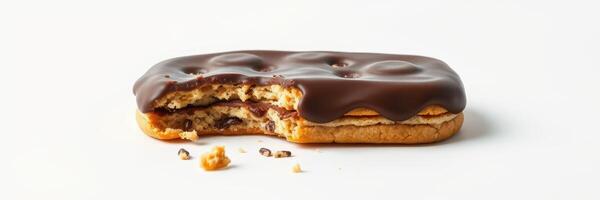 Delicious chocolate-covered cookie with a bite taken out, showcasing its creamy filling and crispy texture photo