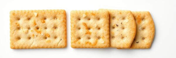 Savory crackers arranged neatly on a plain white background showcasing their crisp texture and golden hue photo