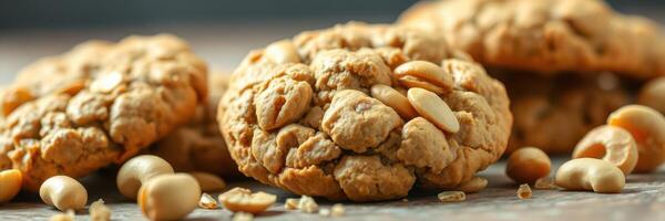 Crunchy nut cookies with oats and cashews on a wooden table in a cozy kitchen setting photo