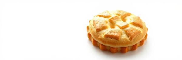 Freshly baked pie displayed on a plain white surface highlighting its golden crust and intricate design photo
