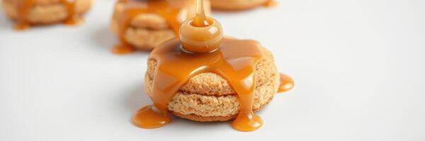 Delicious cookies drizzled with caramel sauce create a tempting dessert experience for sweet lovers photo