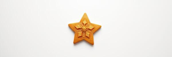 Delicious star-shaped cookie decorated with a festive pattern on a white background during holiday season photo