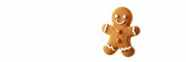 Gingerbread cookie with a smiling face and decorative frosting, perfect for festive occasions photo