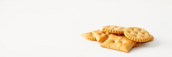 Savory crackers stacked on a clean surface showcasing their golden color and crisp texture photo