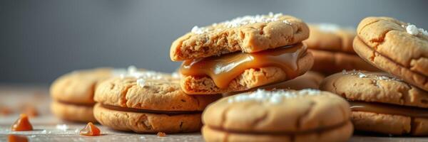 Delicious homemade caramel-filled cookies with sea salt on a rustic wooden surface photo