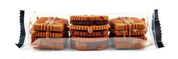 Delicious chocolate-covered cookies stacked neatly in a clear package for a tempting treat photo