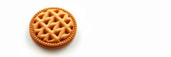 Delicious round cookie with waffle pattern sits on a white background photo
