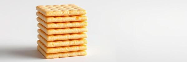 Stack of crispy crackers arranged neatly on a plain surface in a well-lit environment photo