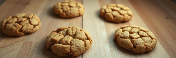 Cookies with a crunchy topping arranged on a wooden surface highlighting their texture and delicious appearance photo