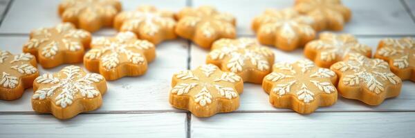 Holiday-inspired gingerbread cookies shaped like snowflakes arranged on a wooden table during winter festivities photo