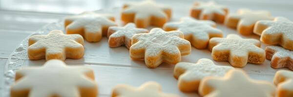 Delicious snowflake-shaped cookies arranged on a decorative plate ready for the festive season photo