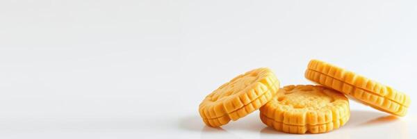 Crunchy cookies stacked neatly on a plain surface in a bright setting evoking a warm and inviting atmosphere photo