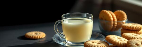 Enjoying a warm beverage with cookies in a cozy setting during the afternoon hours photo