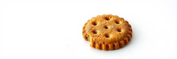 Delicious cookie with a bite taken out, placed against a plain white background, showcasing its texture and design photo