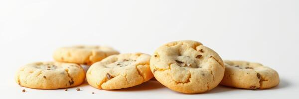 Delicious homemade chocolate chip cookies arranged on a clean white surface photo