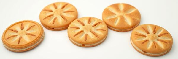 Assorted cookies with intricate patterns arranged neatly on a white background photo