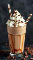 Deliciously crafted chocolate milkshake topped with whipped cream and chocolate shavings in a tall glass photo