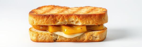 Grilled sandwich with melted cheese and caramelized mango served on toasted bread photo