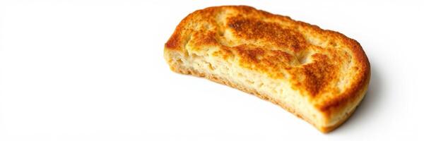 Deliciously toasted bread slice on a plain background showcasing its golden brown crust and soft inside photo