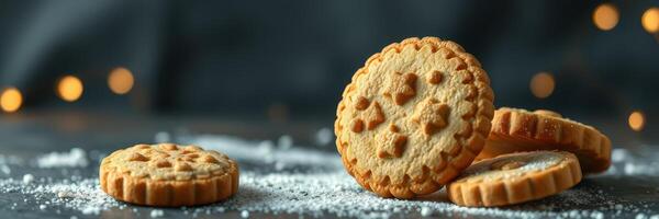 Delicious cookies on a dark surface with sugary decorations and soft bokeh lights in the background creating a cozy atmosphere photo