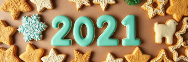 Colorful decorated cookies celebrating the arrival of the new year 2021 with festive designs and shapes photo