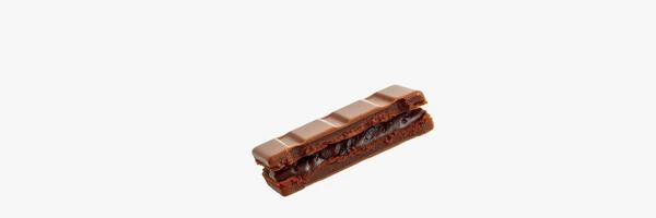 Delicious chocolate bar with a smooth filling and a glossy finish on a clean background photo