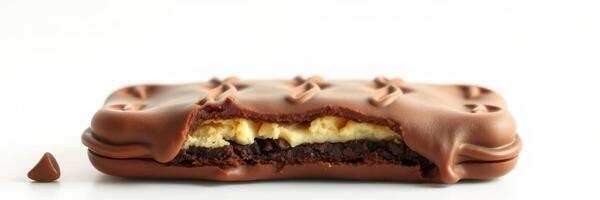 Chocolate cookie dessert with a creamy filling and chocolate coating served on a white background photo