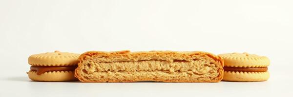 Cream-filled cookies arranged on a clean surface showcasing layers and textures photo