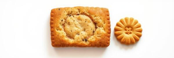 Delicious homemade biscuits displayed on a white surface with unique shapes and textures, perfect for tea time or a snack photo