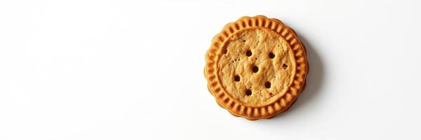Delicious golden cookie with a round shape and distinct texture laid on a clean white background ready for enjoyment photo