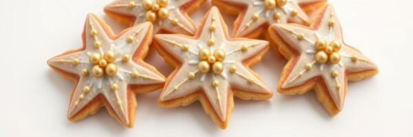 Star-shaped cookies decorated with icing and golden accents for a festive celebration photo