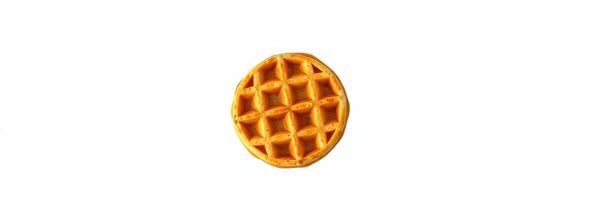 Golden waffle arranged neatly on a plain background for a simple yet appealing food presentation photo