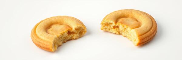 Cookies with a bite taken out, showcasing a delicious and appetizing treat on white background photo