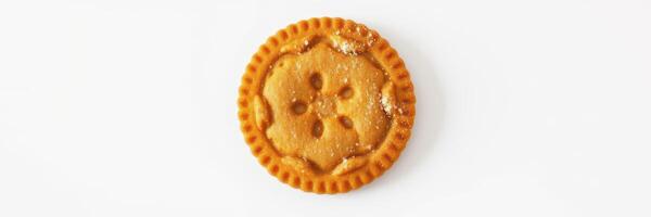 Delicious round cookie with a floral design and sugar coating on a white background photo