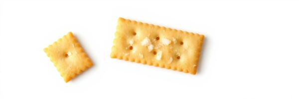 Different sizes of baked crackers displayed on a plain background emphasize snack options photo