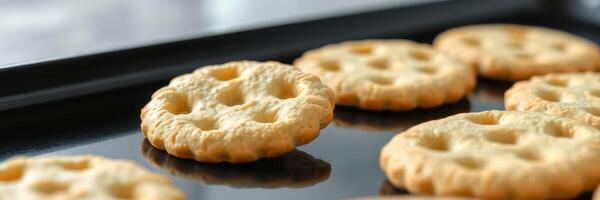 Deliciously baked cookies cooling on a tray in a bright kitchen after a warm afternoon baking session photo