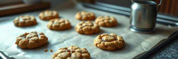 Freshly baked cookies cooling on a tray in a cozy kitchen after a baking session in the afternoon light photo