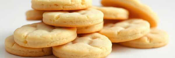 Cookies stacked on a white surface, showcasing a soft and inviting texture, perfect for a quick snack or dessert option during any time of the day photo