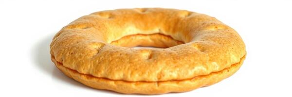 Traditional bagel-style bread displayed on a white background, showcasing its unique shape and texture photo